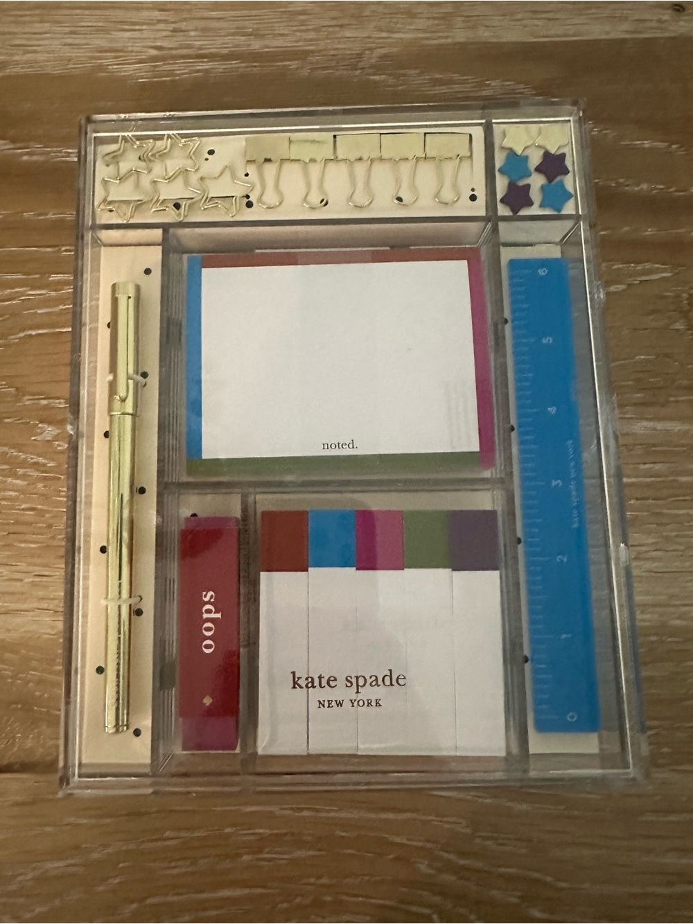 kate spade Clear Acrylic Desk Organizer with Gold Accents and Blue Ruler